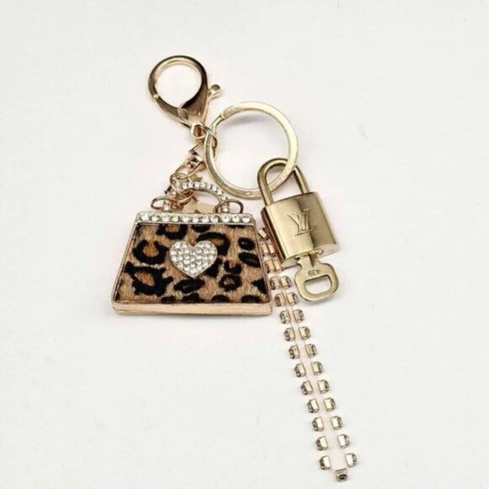 Authentic Louis Vuitton Lock & Key with unbranded Leopard Bagcharm, Keycharm